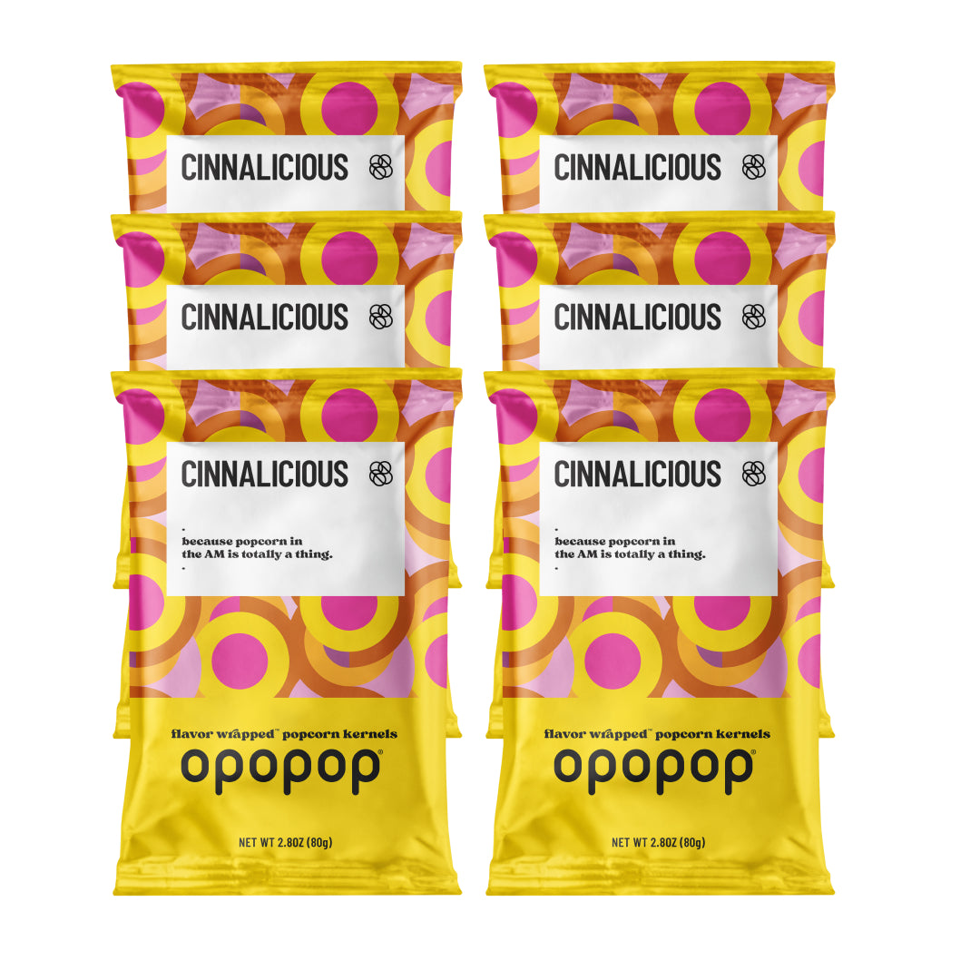 A single green leaf against a white background.