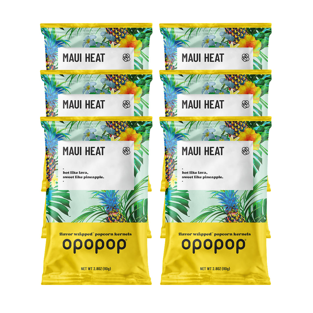 A single green leaf against a white background.